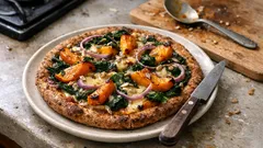 Kürbis-Pizza mit Spinat: knuspriger Vollkornboden und herbstlicher Belag